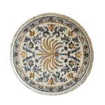 Round Elysian Palm Knotted Wool Area Rug with intricate floral and palm patterns in gold and black on a cream background, featuring detailed border design.