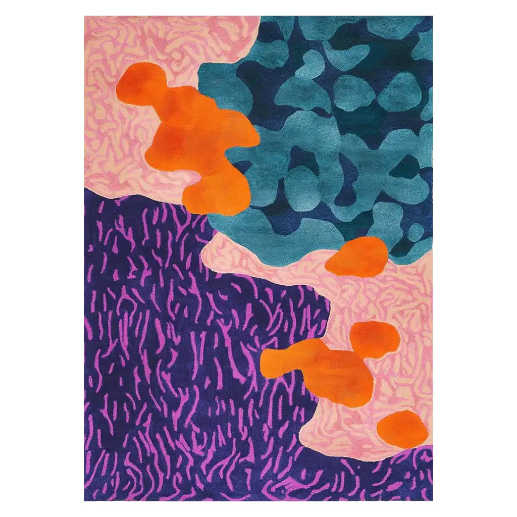Vibrant and artistic area rug featuring an abstract design with bold colors like orange, blue, and purple. The hand-tufted wool rug showcases a dynamic pattern, ideal for adding a splash of color to any room.