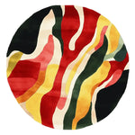 Round wool area rug featuring vibrant, abstract waves in red, yellow, green, and black, perfect for adding a contemporary touch to large living rooms. This hand tufted rug is an ideal choice for those seeking stylish rugs for their living room.