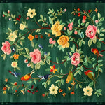 Vibrant Emerald Oasis Hand Tufted Area Rug featuring a lush floral and bird design on a deep green background, perfect for adding an elegant touch to living room and dining room settings. This wool rug showcases intricate details, making it an ideal choice for dining room carpets and enhancing any living space.