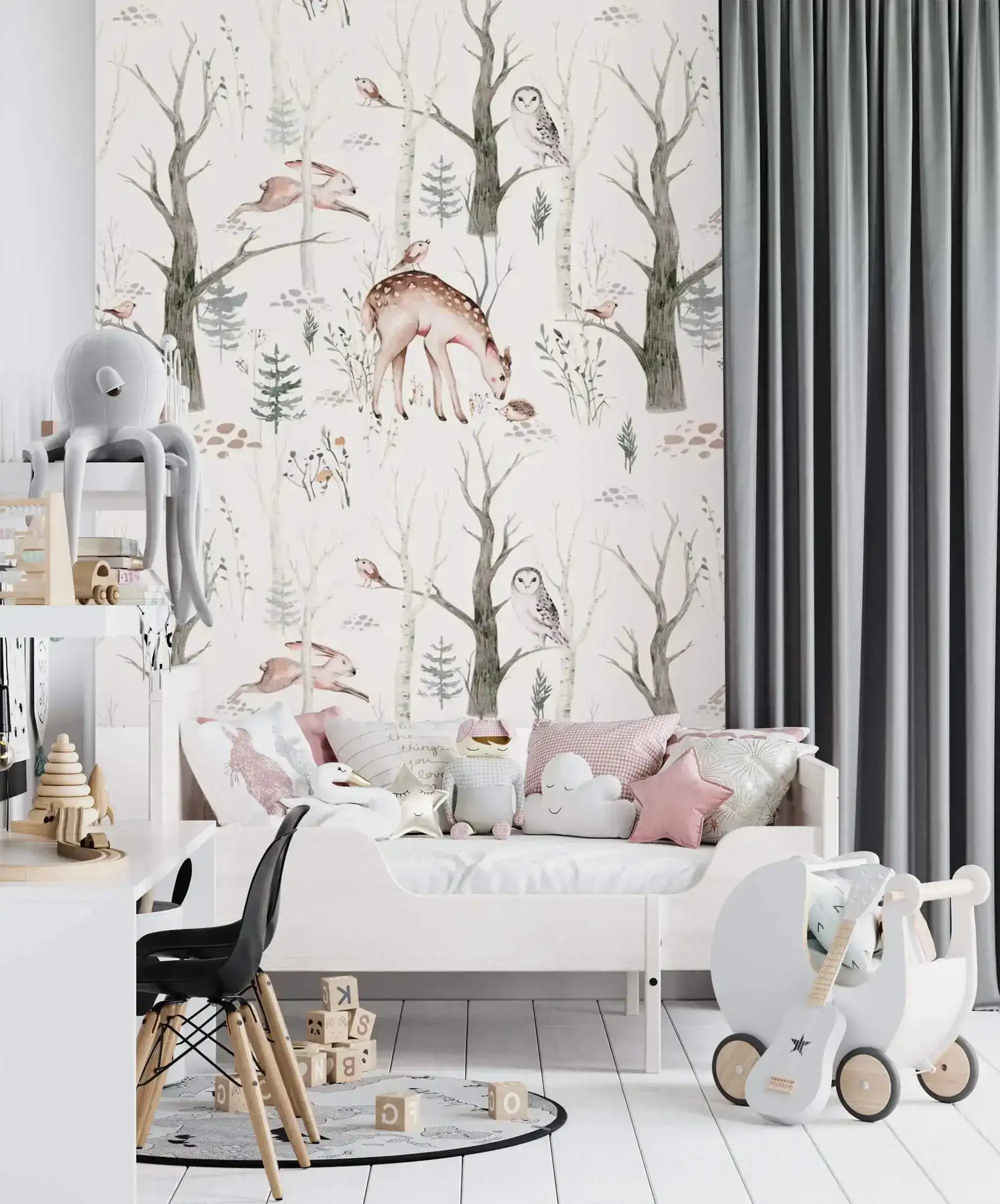 Enchanted Forest Friends wallpaper with deer and owls behind a white daybed and toy pram