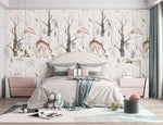 Enchanted Forest wallpaper with deer, owls and rabbits over a cream bed with teal throw