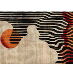 This vibrant area rug, perfect for the living room, features a dynamic abstract design with bold black stripes and warm orange accents, crafted from high-quality wool. This tufted wool rug adds a touch of modern artistry to any living space, making it an ideal choice among area rugs for living rooms.