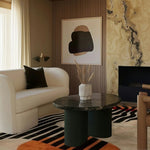 Stylish living room featuring a tufted wool area rug with abstract patterns, complementing the modern decor. The rug adds warmth and texture to the space, ideal for area rugs for living room settings.