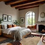 Cozy living room featuring an Energy Pulse tufted wool area rug with a bold abstract design. The area rug enhances the warm ambiance with its rich colors and intricate patterns, perfectly complementing the inviting fireplace and stylish decor, making it an ideal choice for area rugs in a living room setting.