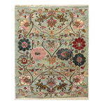 Eternal Bloom Knotted Wool Rug showcasing a vibrant, intricate floral pattern in warm, earthy tones. The area rug features detailed flowers and vines, creating an inviting and artistic atmosphere for any room.