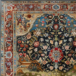 Detailed close-up of the Eternal Blossom Wool Hand Knotted Area Rug featuring intricate Persian-inspired floral patterns. This vintage square area rug showcases vibrant colors, ideal for enhancing large living rooms or office spaces with its luxurious wool texture.