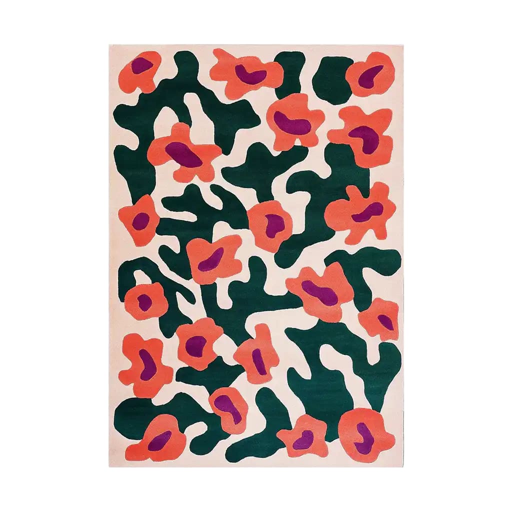 Vibrant area rug featuring an abstract design with deep green and bright orange shapes on a soft cream background. The Ethereal Tiger Haven Hand Tufted Wool Rug adds a bold, artistic touch to any room.
