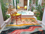 A vibrant, hand-tufted wool area rug perfect for the living room, featuring an abstract design with palm trees, flowers, and a flamingo. The rug showcases a blend of warm and cool tones, creating a stunning visual effect that's ideal for enhancing living room décor.