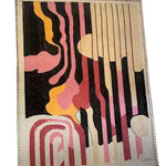 This is a vibrant, hand-tufted area rug measuring 3' x 8', perfect for large living rooms or dining rooms. The contemporary rug features an abstract design with bold, flowing patterns in shades of pink, yellow, and black, creating a striking visual appeal. Made from high-quality wool, this rug adds warmth and style to any living room area.