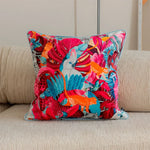 Colorful exotic paradise throw pillow featuring vibrant tropical plants and animals, perfect for home decor