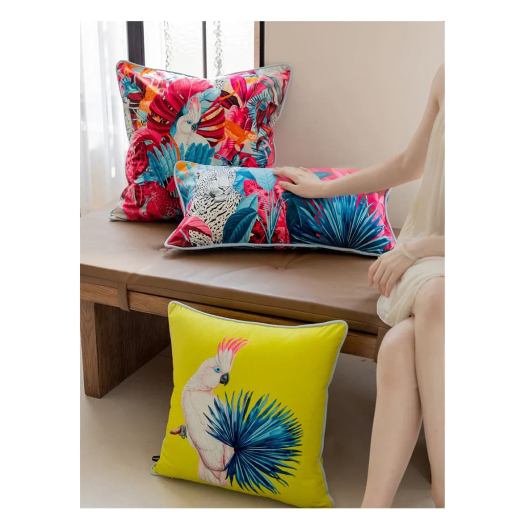 Colorful throw pillows featuring vibrant tropical designs, perfect for adding a touch of exotic paradise to any decor.