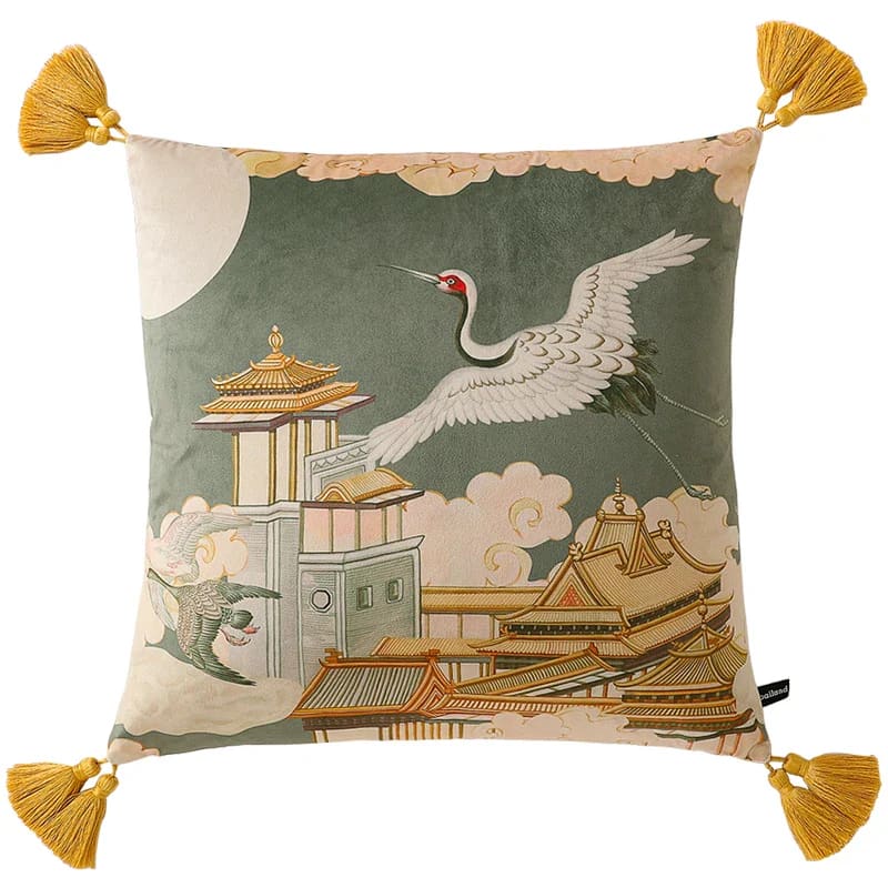 Exquisite throw pillow featuring a crane and pagoda design, adorned with yellow tassels, perfect for adding elegance to any decor.