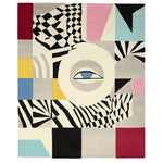 A vibrant and contemporary area rug showcasing an abstract design with bold geometric patterns and a central eye motif. This large living room rug is hand-tufted from wool, offering a modern touch to any space. Ideal for those seeking unique living room area rugs.