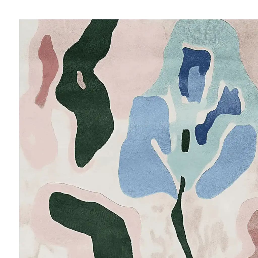 Close-up view of the Fading Petal Motion Hand Tufted Area Rug showcasing its contemporary abstract design in soft pastel colors. Perfect for adding a modern touch to living room area rugs, this wool rug blends subtle tones of blue, green, and pink.