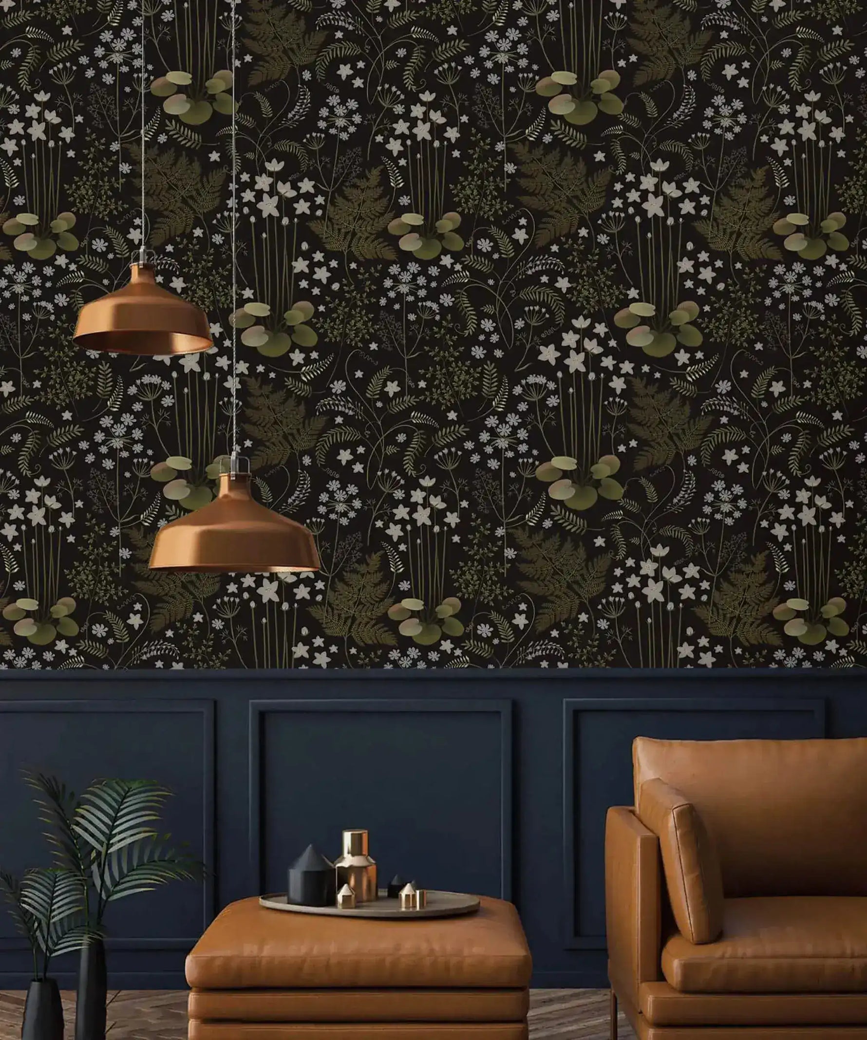Fern blossoms monochrome wallpaper as accent wall in dark living room with copper pendants and tan leather armchair