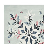 Close-up of the Festive Snowflake Hand Tufted Rug, showcasing intricate snowflake and leaf patterns in soft pastel colors. Perfect wool area rug for living room, adding elegance and warmth to your space.