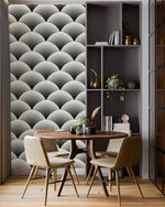 Fish scale art deco wallpaper feature wall, black and white scalloped fans beside a round dining table