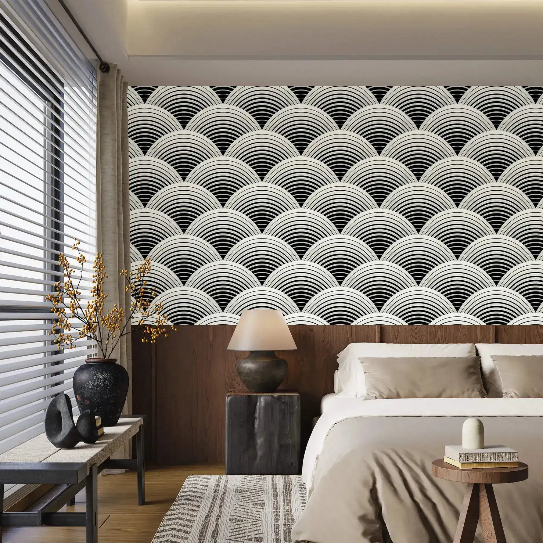 Fish scale art deco wallpaper in a bedroom, black and white scalloped fans above a wood headboard