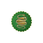 Flat overhead shot of the scalloped green snake and apple rug, striped serpent centered