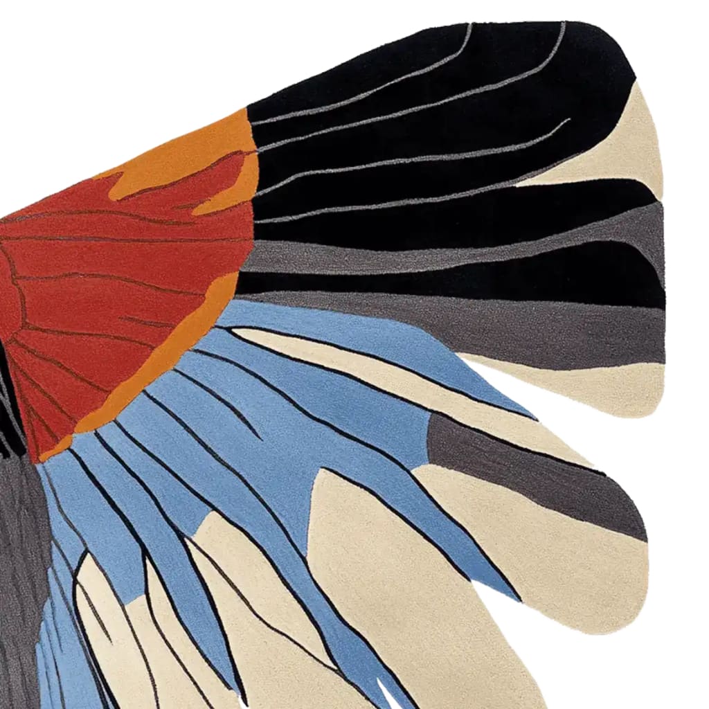 A contemporary hand-tufted wool area rug featuring an abstract design with vibrant colors including red, orange, blue, black, and beige. Ideal for adding a modern touch to any living room.