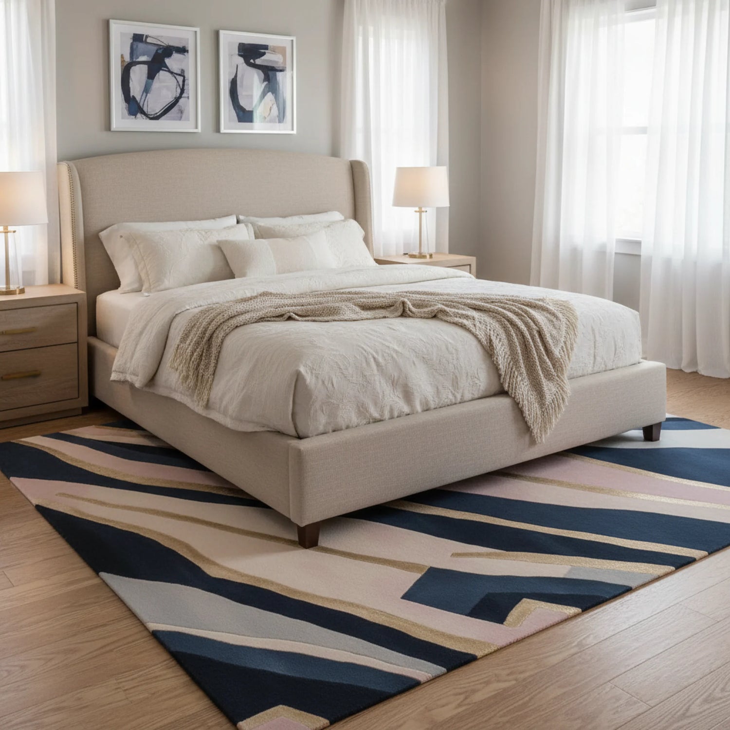 Neatly made bed in a bedroom with a striped rug and framed artwork on the wall.