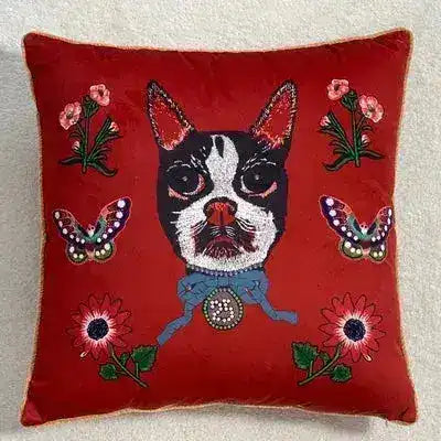 Decorative throw pillow featuring a vibrant red background with an embroidered cat design surrounded by flowers and butterflies, perfect for adding a pop of color to any space.