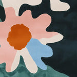 A vibrant area rug showcasing a contemporary design with abstract floral patterns in shades of pink, orange, blue, and green. Perfect for adding a touch of modern elegance to any living room, this wool rug is ideal for those looking for stylish rugs for living room or living room rugs 8x10.