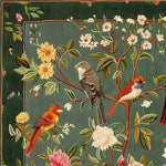 Beautiful square area rug featuring a vibrant floral and fauna design with colorful birds perched on branches. Ideal for adding a touch of nature to your living room or office, this hand-tufted wool rug offers elegance and warmth.