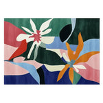 Vibrant Flora Flutter Hand Tufted Area Rug with abstract floral patterns, perfect for adding a contemporary touch to your living room. This wool rug features colorful designs in shades of green, pink, orange, and blue, making it an ideal choice for those seeking unique living room area rugs.