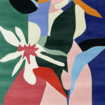 The Flora Flutter Hand Tufted Rug showcases a vibrant abstract design with bold colors, ideal for adding a contemporary touch to any room. Perfect as an area rug for the living room, this wool rug combines style and comfort effortlessly.