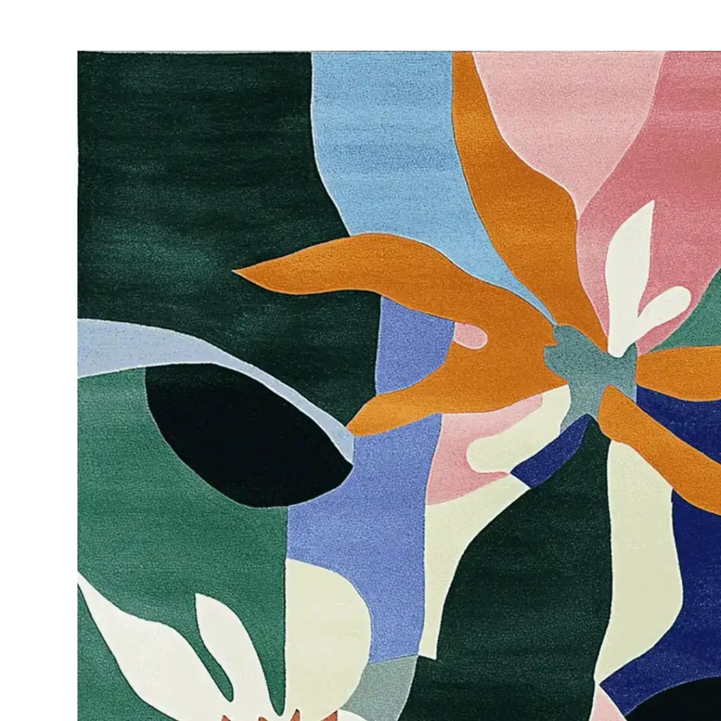 Vibrant Flora Flutter Hand Tufted Area Rug with an abstract floral design in bold colors, perfect for contemporary living rooms. This wool rug showcases a beautiful mix of green, blue, pink, and orange hues, adding a touch of modern elegance to any living room area.