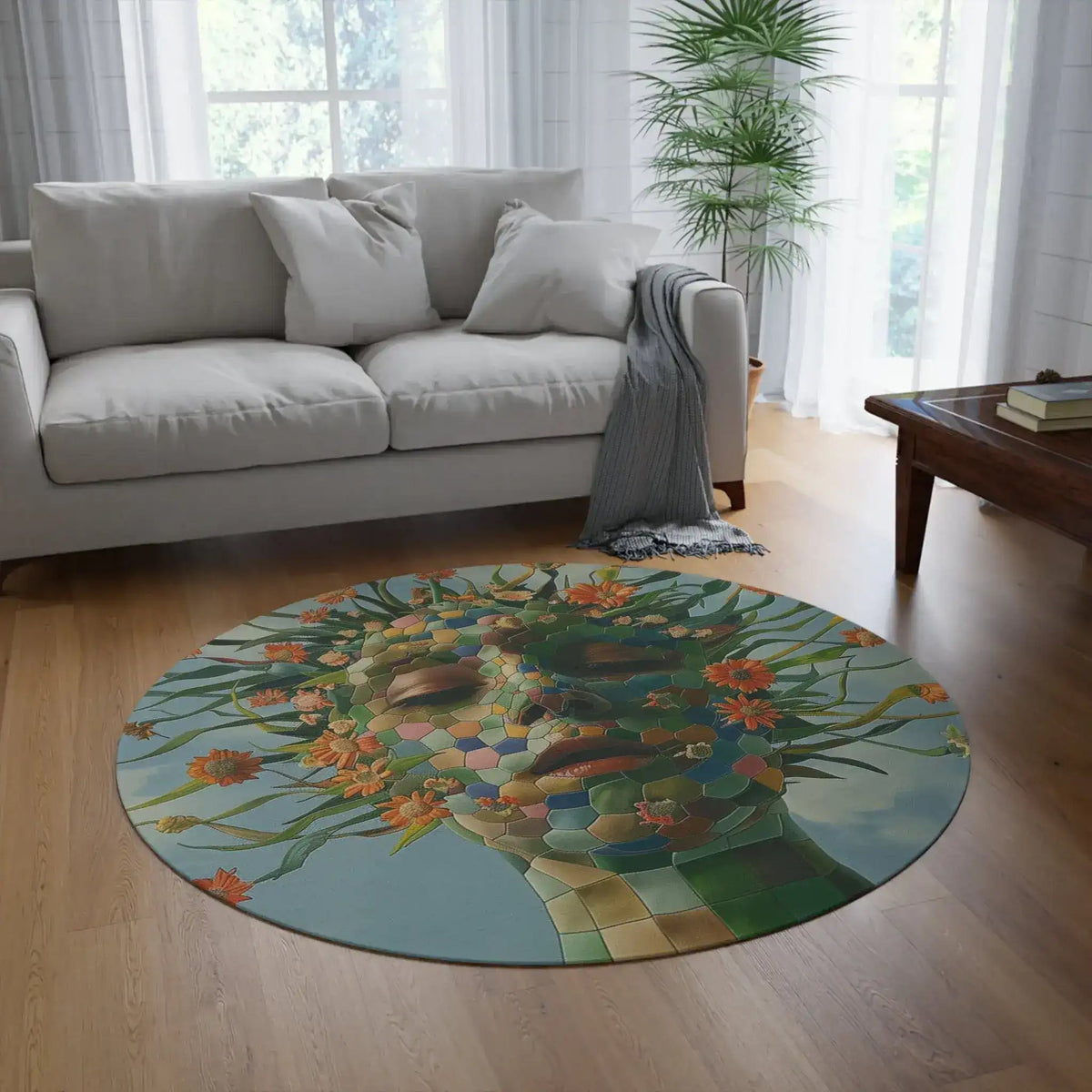 Floral Abstract Portrait Round Rug on hardwood floor in modern living room beside grey sofa with tropical plant