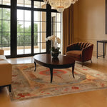 This elegant living room features a beautiful Floral Archway Hand Knotted Area Rug, perfectly complementing the sophisticated decor. The vintage rug showcases intricate Persian designs, adding a touch of timeless elegance to the space. Ideal for large living rooms, this luxurious piece seamlessly integrates with the room's aesthetic, offering both style and comfort.