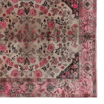 Top view of the Floral Aura Knotted Wool Area Rug featuring intricate pink and beige floral patterns, ideal for enhancing the elegance of living room spaces. This floral rug is perfect for those seeking stylish and comfortable living room area rugs.