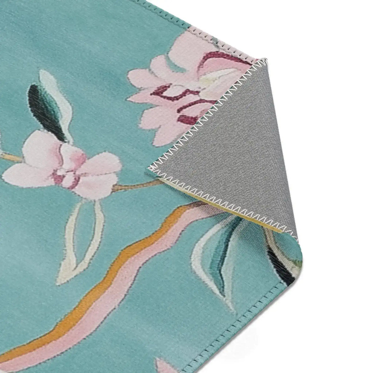 Decorative throw pillow with pink and blue ornate interior scene print featuring gold furniture motifs and white zipper closure
