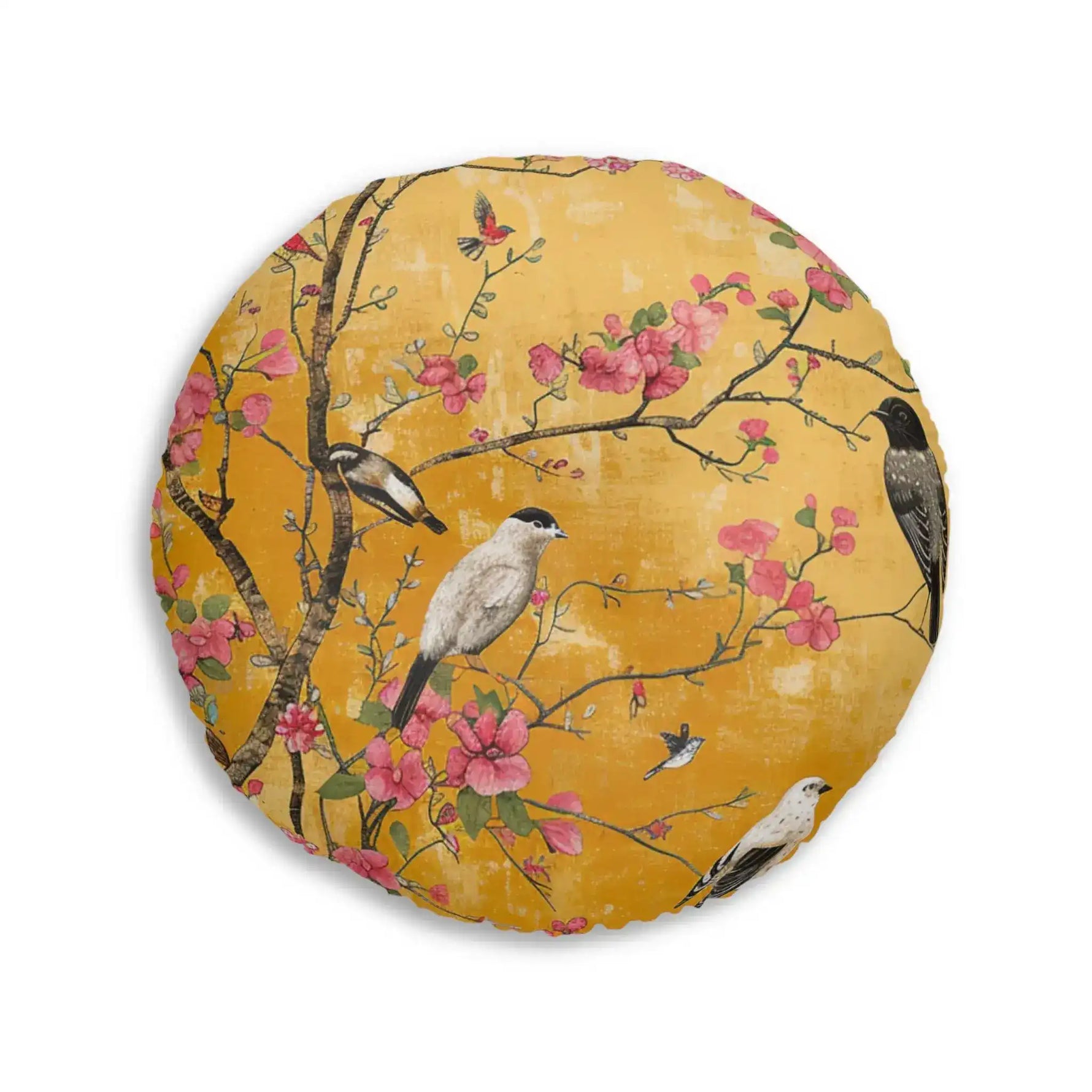 Round floor pillow with amber-gold background, multiple birds resting on blooming cherry branches, Floral Birds and Blossoms Floor Pillow close front