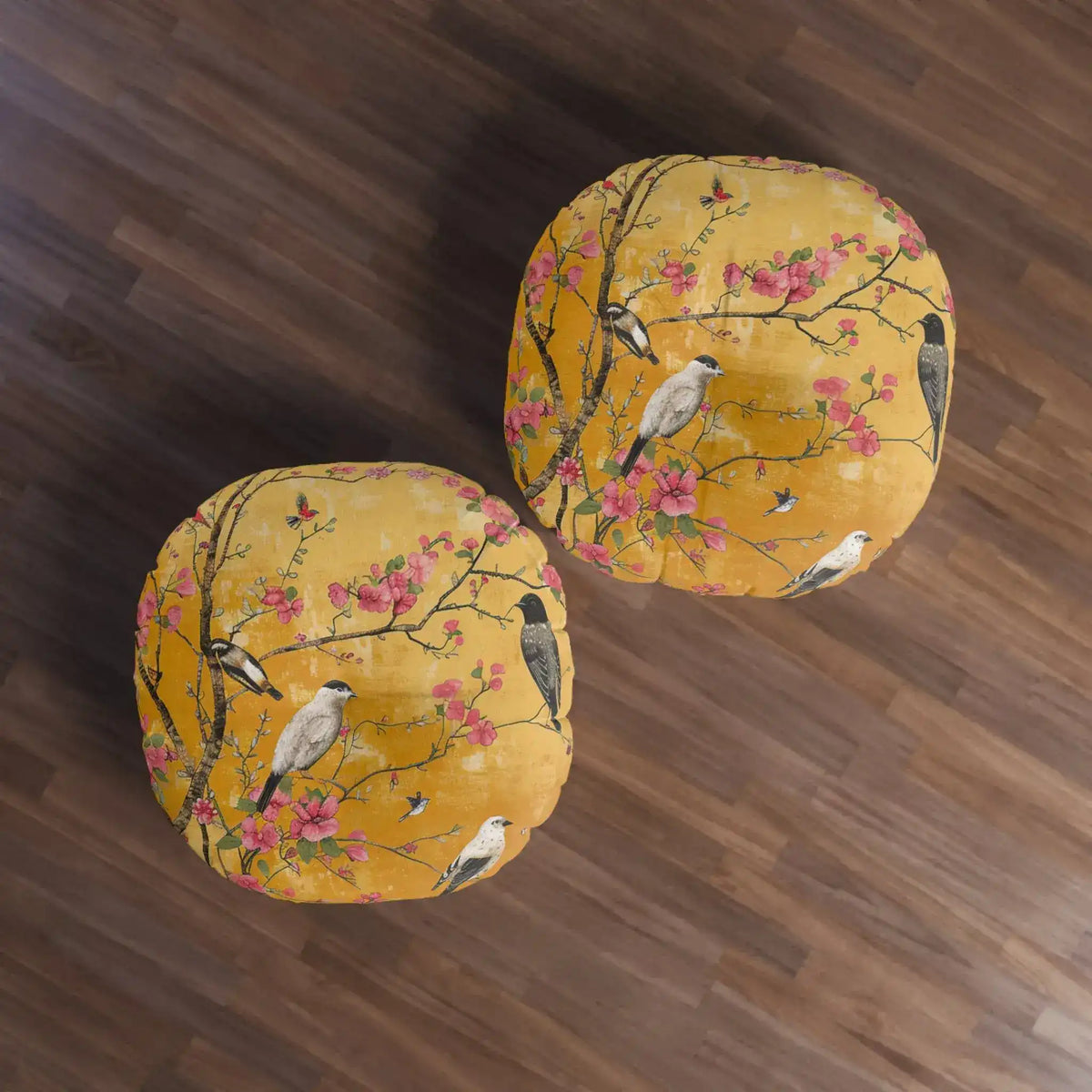 Two round floor pillows overhead view on wood floor, amber-gold chinoiserie birds and pink blossoms, Floral Birds and Blossoms Floor Pillow overhead pair
