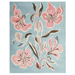 Vibrant Floral Brush Symphony Hand Tufted Area Rug featuring elegant pink blossoms on a soothing blue background, perfect for adding a contemporary touch to any living room. This wool rug showcases an artistic design ideal for modern home decor.