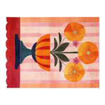 Bright and colorful Floral Chalice Hand Tufted Wool Rug, featuring vibrant orange and pink floral designs, perfect as an area rug for a living room. This 8x10 wool rug adds a touch of artistic flair and elegance to any space.
