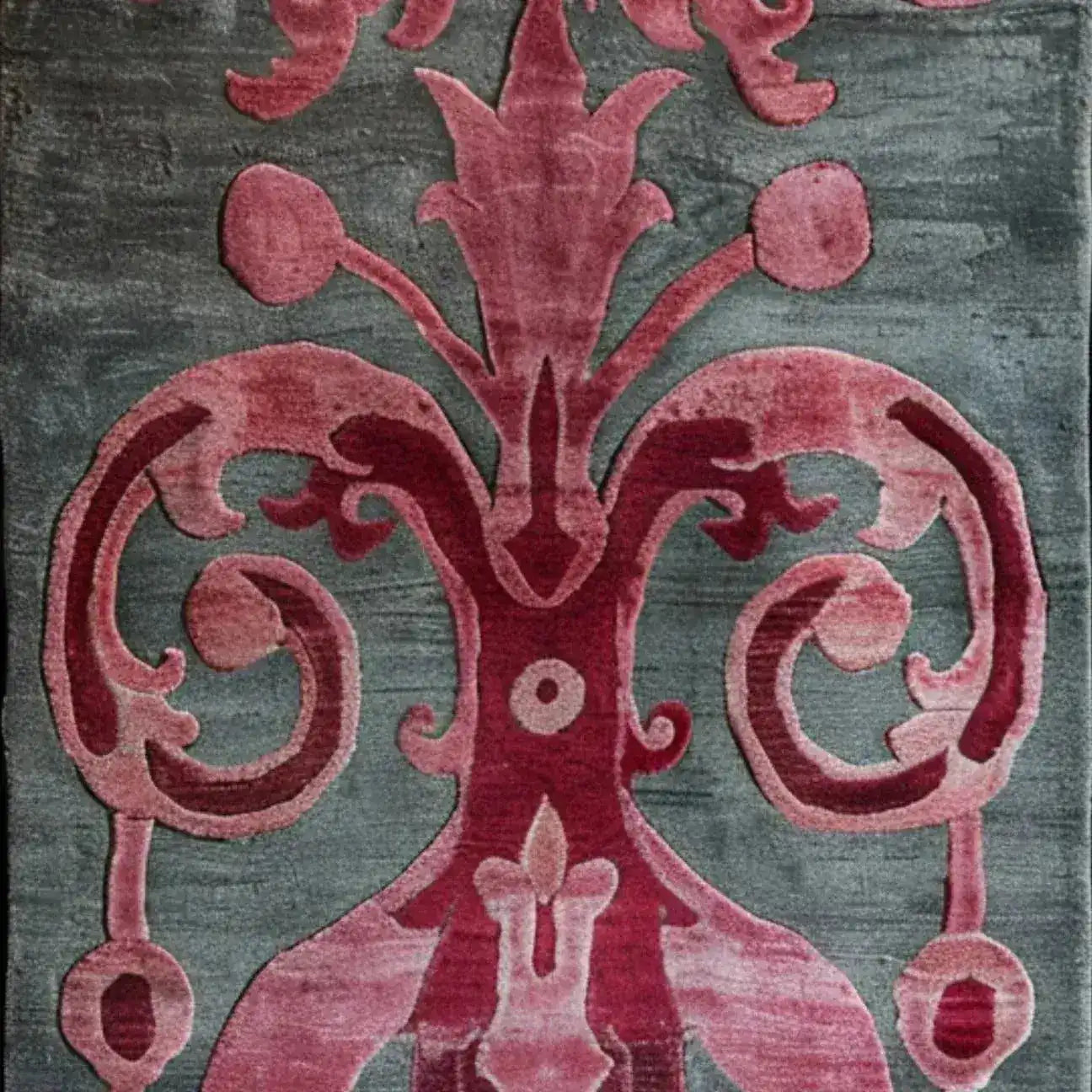 Close-up view of a Floral Damask Hand Tufted Wool Runner Rug featuring intricate pink and red patterns on a gray background. Perfect for enhancing spaces as an area rug, kitchen runner rug, or large living room rug. Ideal for adding elegance to your hallway or bathroom.