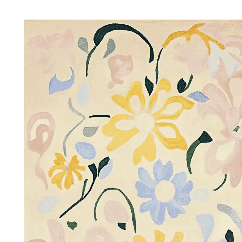 Close-up view of the Floral Dance Memory Hand Tufted Rug, showcasing its vibrant floral pattern. This contemporary wool area rug, perfect for living rooms, features an elegant mix of yellow, blue, and pink flowers against a soft beige background.