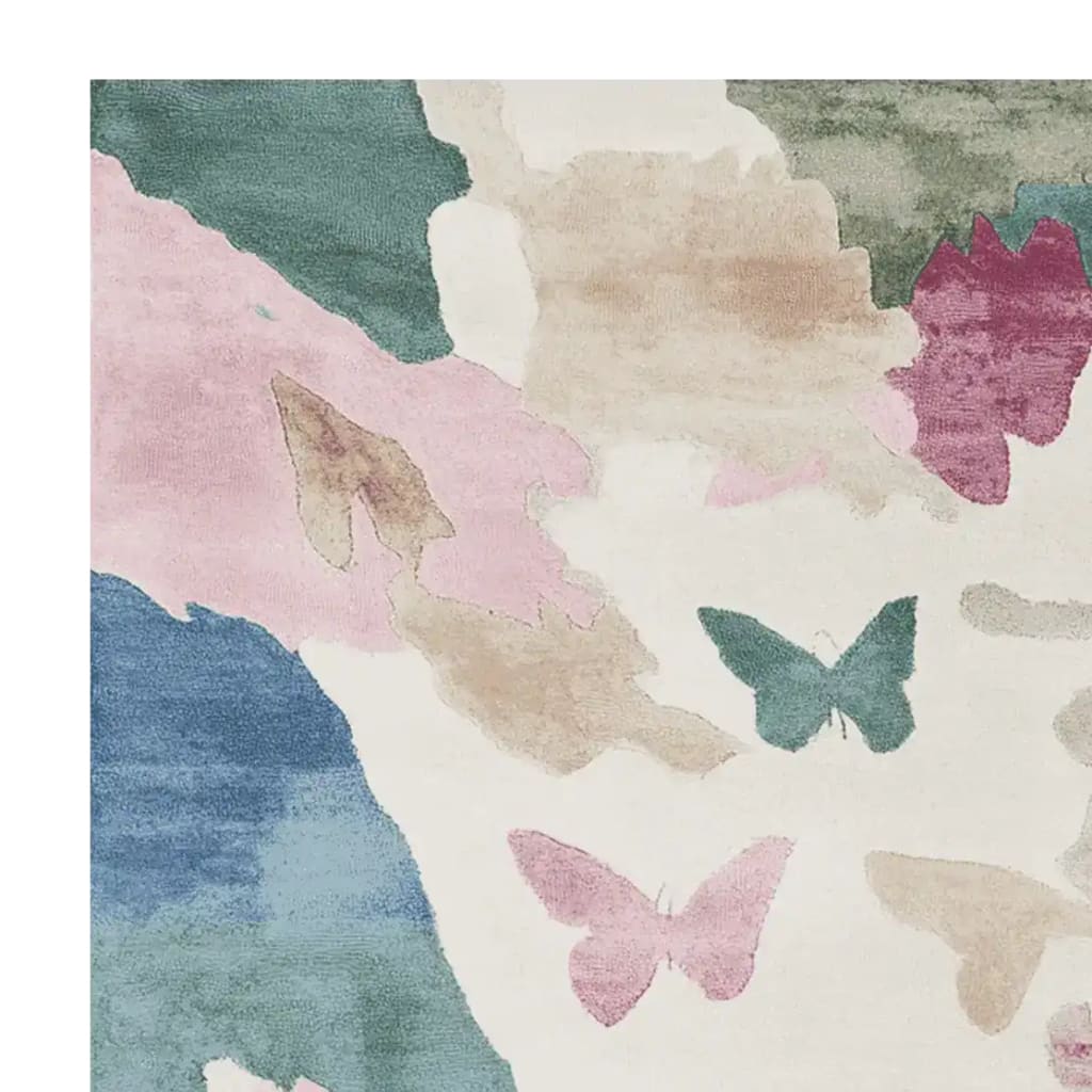 A contemporary hand-tufted area rug featuring a floral drift pattern with soft hues of pink, blue, green, and beige. This wool rug is perfect for adding a touch of elegance to living room spaces, offering both style and comfort.