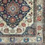 A close-up view of the Floral Euphoria Hand Knotted Area Rug, showcasing its intricate vintage Persian design with vibrant floral patterns. This 8x10 rug is perfect for adding a touch of elegance to living room spaces, combining both traditional and floral rug styles.