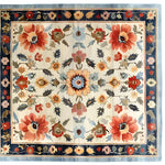 A beautiful Floral Extravaganza wool hand-knotted area rug showcasing an intricate floral design in vibrant colors. Perfect for enhancing the charm of bedrooms, living rooms, and dining rooms, this Persian-style wool rug combines elegance with durability.
