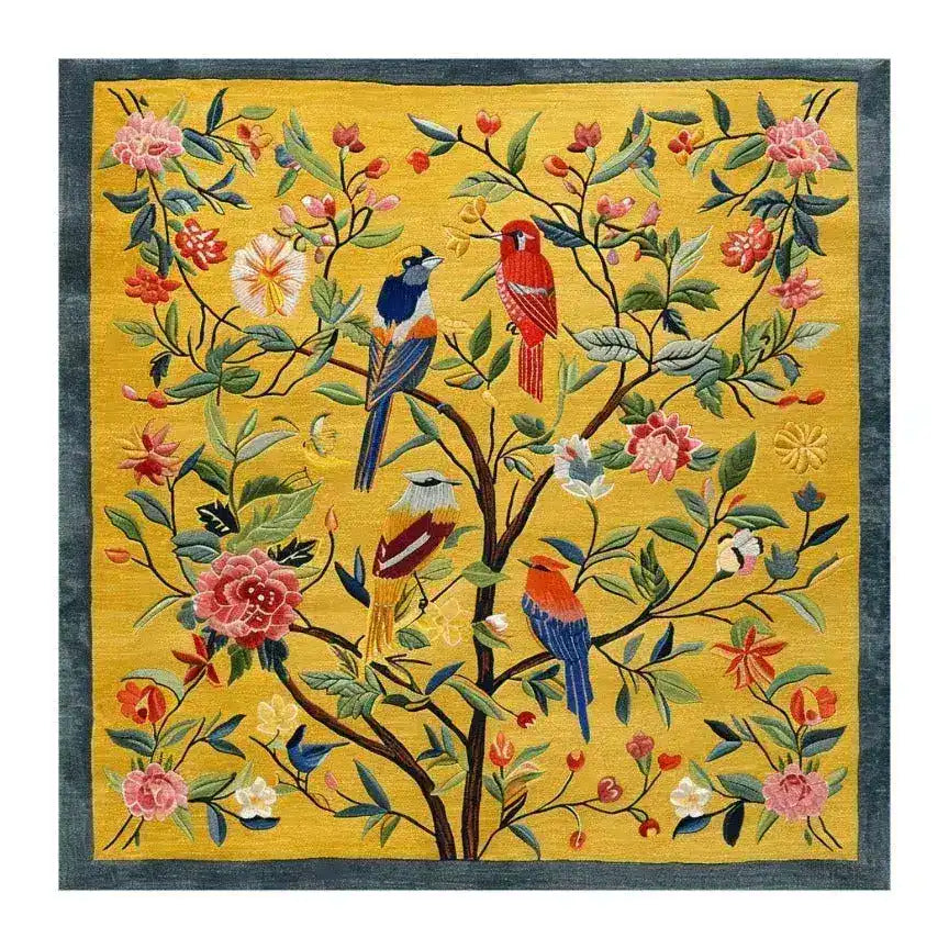 Vibrant hand-tufted wool area rug featuring a colorful floral and bird design, perfect as a square area rug for a living room. This floral rug showcases intricate details with a blend of vivid colors on a yellow background, making it an ideal choice for living room rugs in 8x10 dimensions.