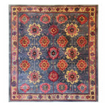 A beautifully crafted Floral Fusion Hand Tufted Rug, featuring a vibrant floral design with red, yellow, and blue hues. This square area rug is perfect for adding a touch of vintage charm to your office or living room. Made from high-quality wool, this large area rug combines durability with elegance, ideal for those seeking a floral rug that enhances any space.