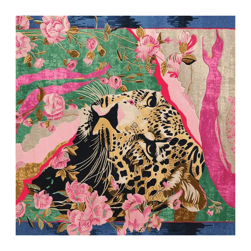 Floral Jaguar Reign Hand Tufted Rug featuring a vibrant and artistic depiction of a jaguar surrounded by pink flowers and colorful abstract patterns. This square area rug, made from high-quality wool, is perfect for adding a bold statement in living rooms. Ideal for those seeking unique rugs for living room decor.