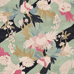 A beautifully designed area rug showcasing a floral pattern with vibrant pink, white, and green hues. This wool rug is perfect for adding a touch of elegance to your living room area, combining both style and comfort in one piece.