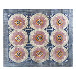 A beautifully designed area rug with a floral pattern, perfect for adding a touch of elegance to any living room. The hand-tufted wool rug showcases intricate pink and orange flowers against a blue backdrop, ideal for living room rugs sized 8x10.
